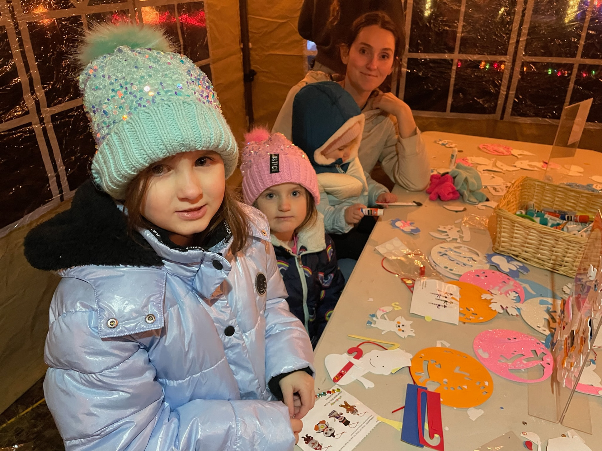 Kids making ornaments at the craft table